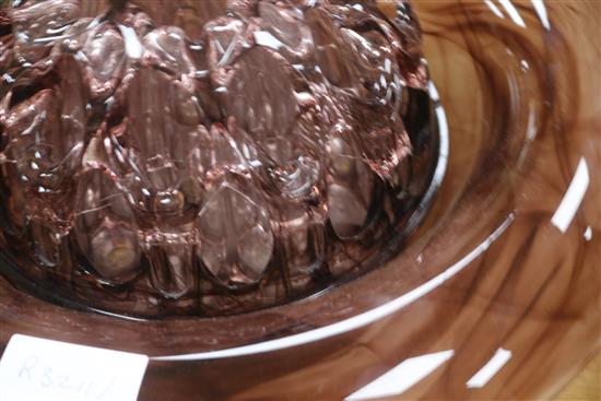 A large glass amethyst bowl